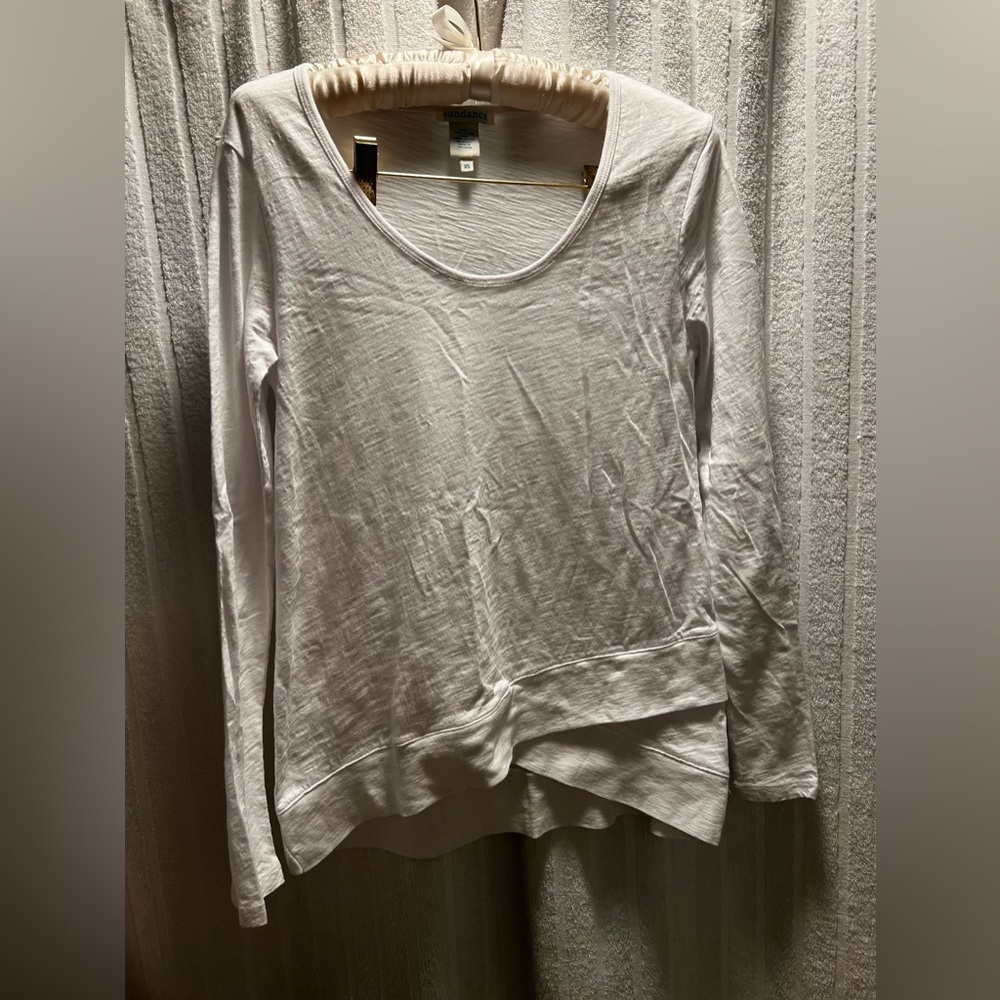 Sundance small white long sleeve shirt. Cute wrapped look on bottom.